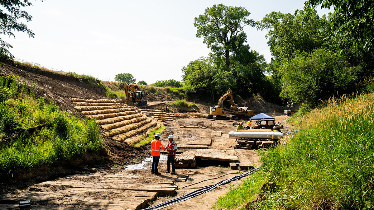 Shoreline restoration work is progressing well with the vegetation being replanted along the banks of Mill Creek. In this photo, natural erosion taking place before the Milepost 14 incident has been repaired and mitigated for the future flow.