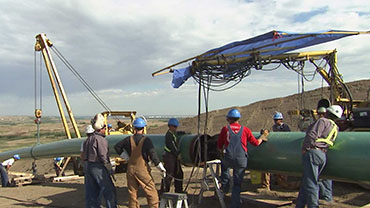 Photo of smart pig in line inspection tool | TC Energy Watch video smart pig in line inspection tool.