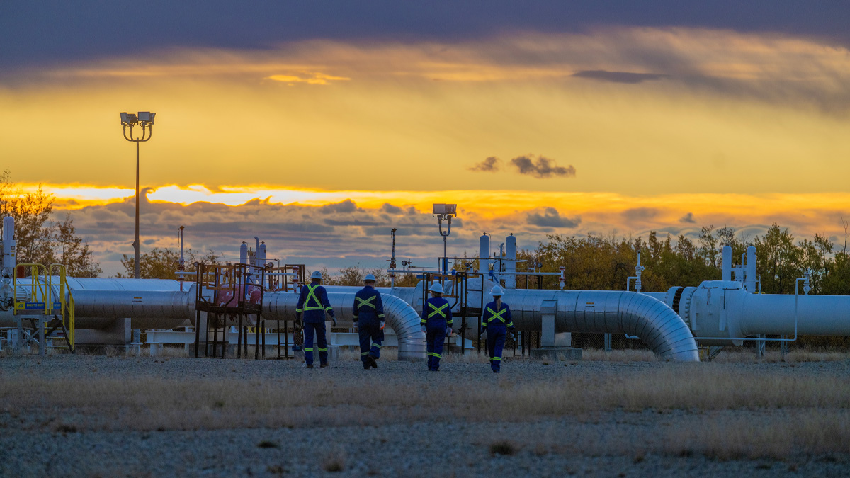 Workers at a pipeline
