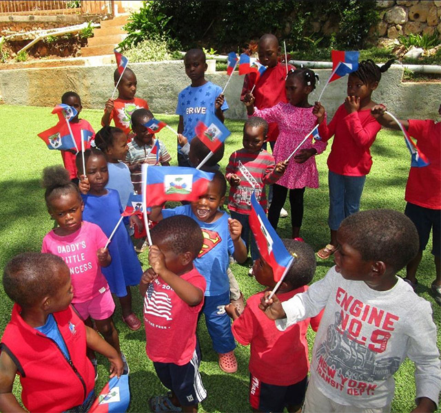 tc-haitian-children-celebrating-water-in-orphanage-640x600.jpg